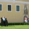 Taxi driver and literary and 
cultural maven Marius Huszar embraces silhouettes of Brahms and Bruckner on the St. Florian monastery grounds.