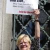 Kathy Lefkowitz, who manages the Walls branch of the Cleveland Public Library, says her sign says it all