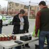 Pat and Kathy Theobald of Lakewood and Jan Meyer of Hudson stopped by the Fresh Fork Market drop site in the Tremont neighborhood of Cleveland. Customers can pay up front or in installments to get a bag filled with locally-produced foods.