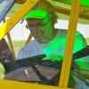 Joe Murray fills out paperwork before leaving Beach City Airport.