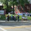 Anti-fracking advocates line up along West Riddle Avenue in downtown Ravenna.