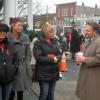 Chardon Superintendent Joe Bergant (R) talks with some former students.