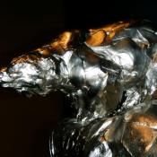 Bart Walter's bronze "Climate Change" shows a polar bear's tenuous grip on a melting ice flow.