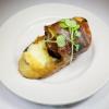 Dick Kanatzar's Amuse Bouche: Grilled crostini with speck-wrapped fig, burrata, apple cider gastrique, pumpkin seed oil