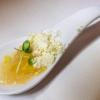 Intermezzo: Spherical tomato consomme, olive oil dirt, garlic chip, micro-basil