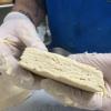 Chef Smith shows off a well-made biscuit with the promise of many nooks and crannies for butter to seep into.
