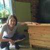 Frequent Local Roots shopper Louise Fleming Dufala is pleased to discover a bat house amid all the farm-fresh fruits and vegetables. 