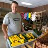 Farmer Jacob Wesley arrives from Pleasant Valley Growers in Lucas with summer squash.