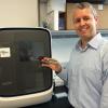 Michael Gilkey is operations manager for the National Center for Regenerative Medicine at Case Western Reserve University. He's working with researchers at the Cleveland Clinic and University Hospitals to develop methods to produce customized stem cells to treat specific conditions. Here he's holding a chip that conducts DNA sequencing to test the functionality of stem cells produced in the lab.