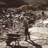 Volunteers and hired hands sift through a pile of shale left by road crews. The amateur scientists struggled to keep up with the break-neck pace of the interstate 71 construction from 1965 - 1968.